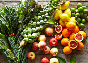 a group of fruits and vegetables on a wood surface Healthy Weight Loss Diets Devizes